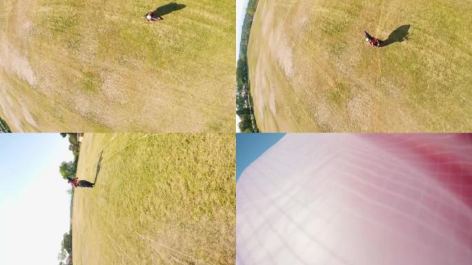 滑翔伞上方，降落伞降落到地面垂直视频