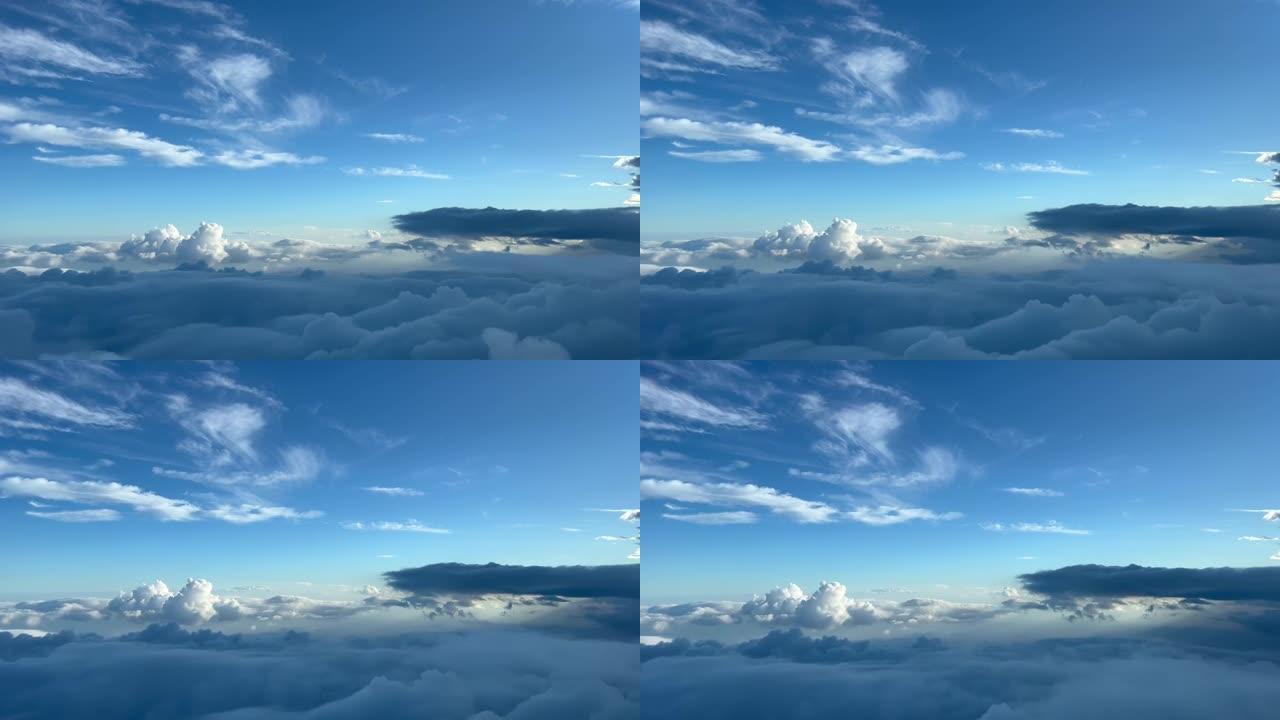 日落前，喷气式飞机驾驶舱飞越汹涌的天空，令人叹为观止。飞行员的观点在10000米高。4K 60 FP