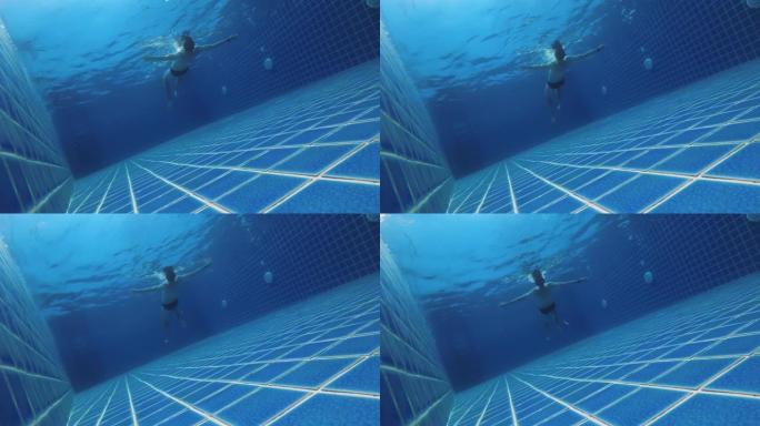 穿着泳装的高加索人的背景图漂浮在私人游泳池边的表面上，享受着这个过程