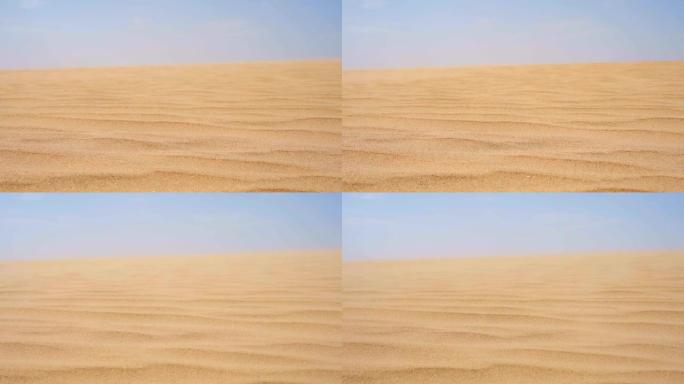 沙漠中的金色沙子，微风轻拂。