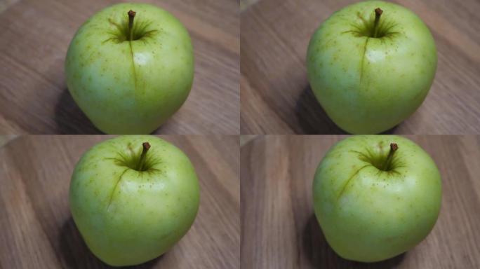 Reinette Simirenko品种的一个苹果，视频。青苹果特写。