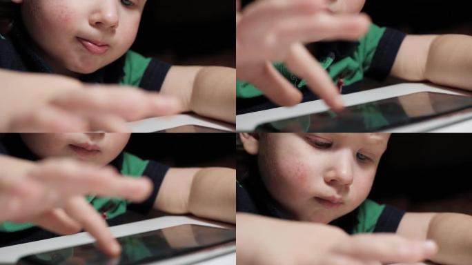 宝贝玩电话。正在专心玩智能手机并用手指点击屏幕的孩子的脸部特写镜头，相机交替显示脸部和手部。慢动作视