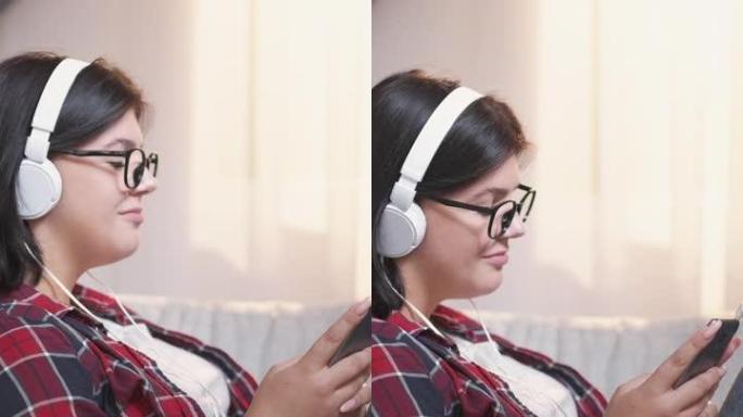 垂直视频音乐应用女人耳机手机
