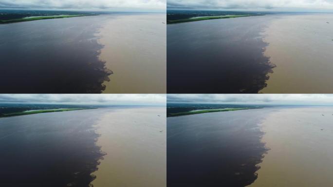 两条河流与里奥内格罗和里约亚马逊的汇合处相遇，显示了河流的两种颜色。