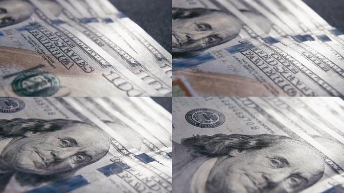 极限微距视频。100美元钞票的特写。摄像机运动超过100美元。美国现钞钞票的细节和质地。