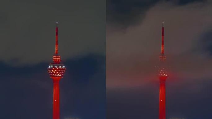 农历新年期间马来西亚吉隆坡城市景观的延时4k UHD镜头，建筑颜色变为红色