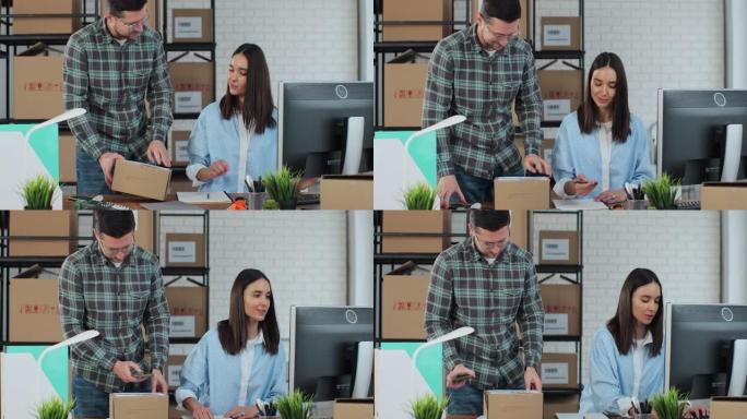 一男一女在仓库工作。年轻女子使用电脑，男子在盒子上确认联系方式。