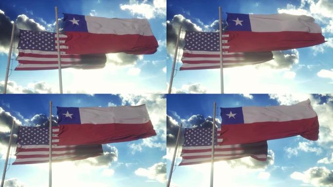 旗杆上插着智利和美国国旗。智利和美国在风中挥舞国旗。智利与美国的外交概念
