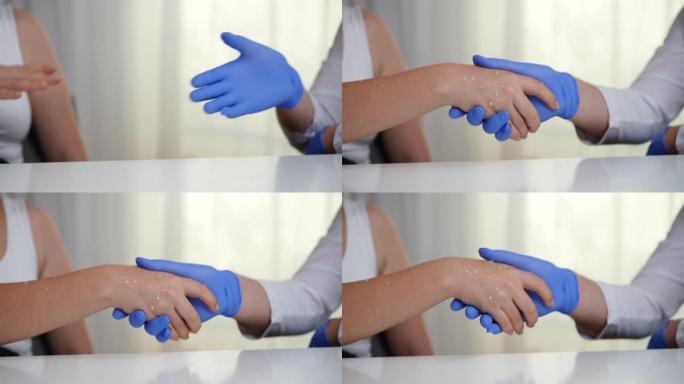 患病的猴痘皮疹患者戴着医用手套与医生握手。无法辨认的白人年轻女子在室内慢动作与专业医生握手。