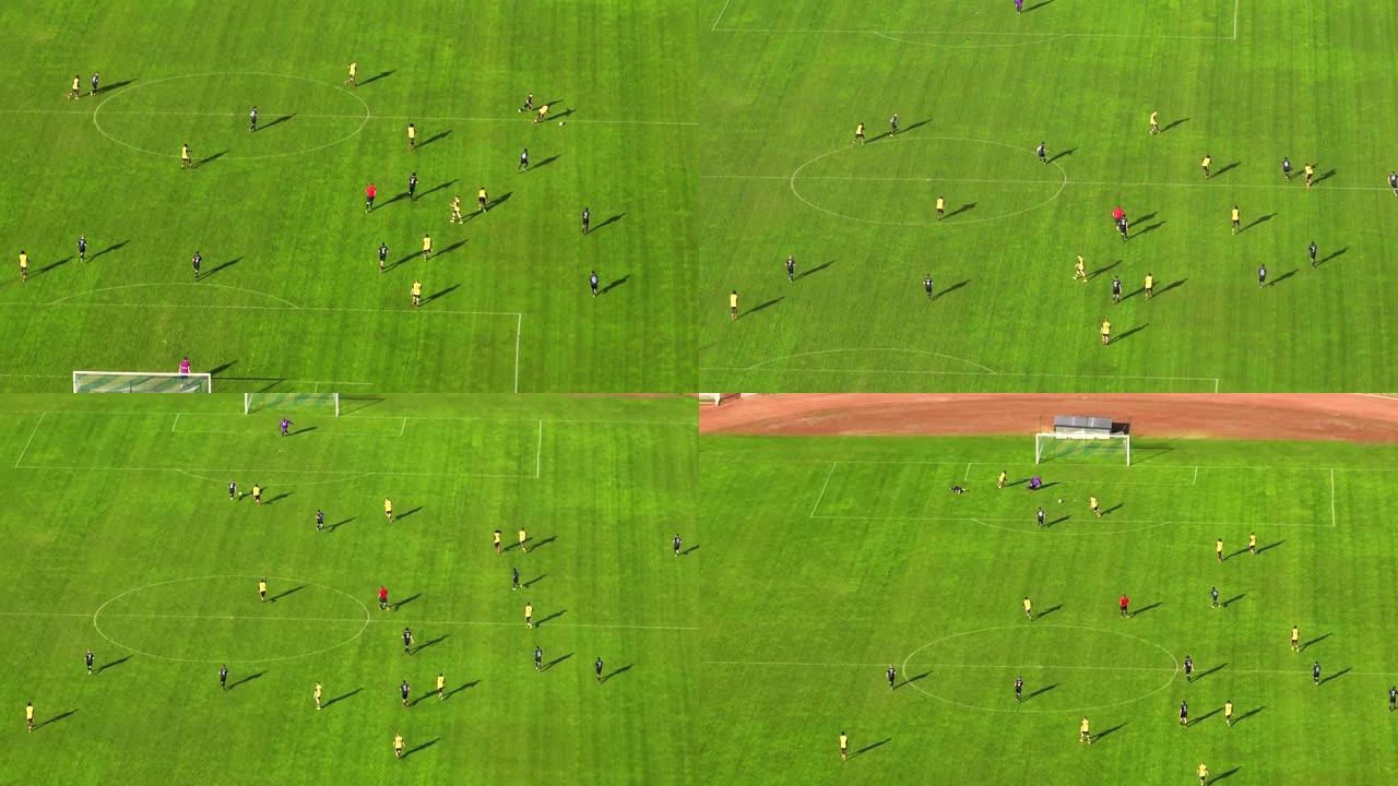 镜头飞过专业人士奔跑、相互竞争的绿色足球场。由具有视差效果的无人机拍摄的足球比赛