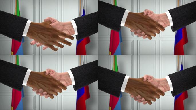 厄立特里亚与俄罗斯达成协议握手，政治说明。正式会议或合作，商务见面。商人和政客握手