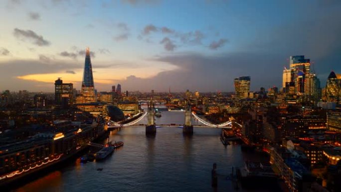 鸟瞰伦敦天际线的碎片大厦，塔桥和泰晤士河在黄昏- 4k视频