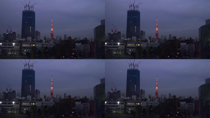 黄昏的东京天际线。夜间从东京六本木照亮东京塔和天际线。