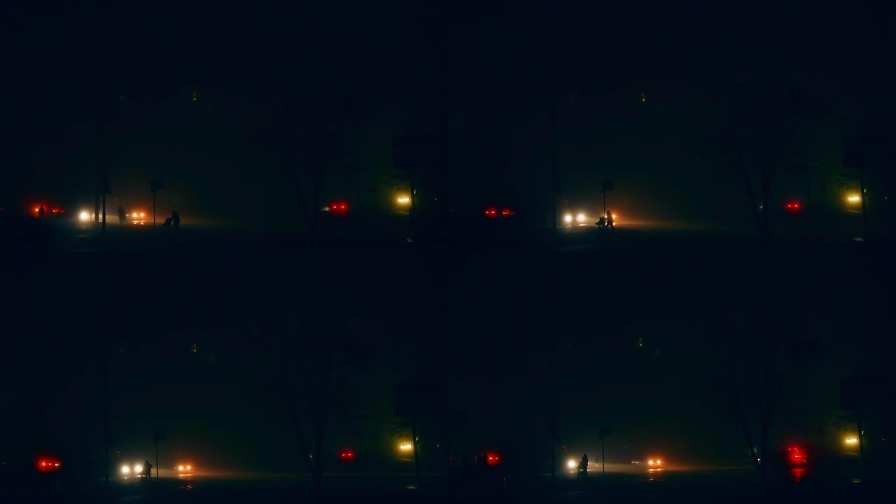晚上城市里没有照明。现代大都市的停电和能源危机。黑暗中汽车的灯光。