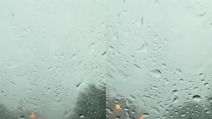 在暴雨和洪水中开车并向挡风玻璃望去