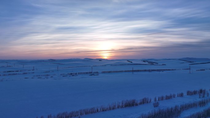 航拍4K内蒙古苍茫雪原夕照