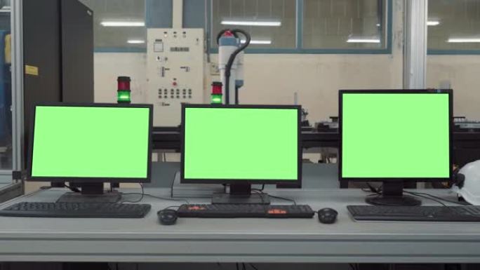 自动化工厂工业机器人绿屏显示笔记本电脑