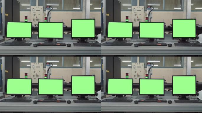 自动化工厂工业机器人绿屏显示笔记本电脑