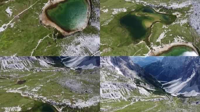 在意大利白云岩三峰附近的两个绿色山湖上飞行，天气晴朗