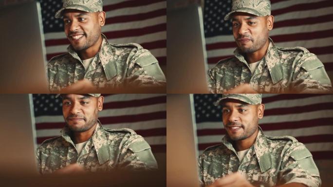 与军队里的家人联系:一名美国士兵用笔记本电脑进行视频通话