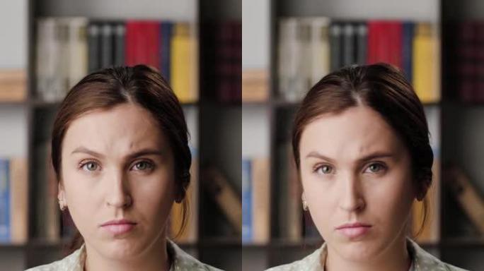 女人示意不。垂直视频中，一名女性在办公室或公寓里看着摄像头，消极地左右移动她的头，表示不。头像