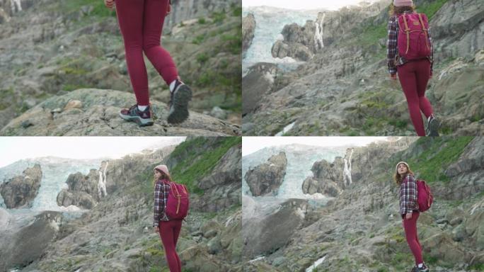 女人在Jostedalsbreen冰川的背景下徒步旅行