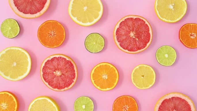 停止运动柑橘类水果模式。半片水果订购并制作粉红主题框架