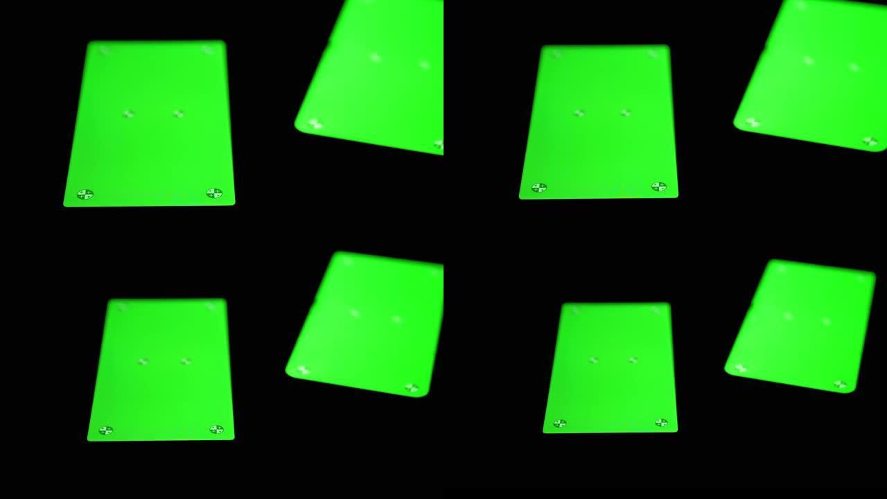 两款智能手机，带有绿色屏幕，色度，黑色背景上的标记