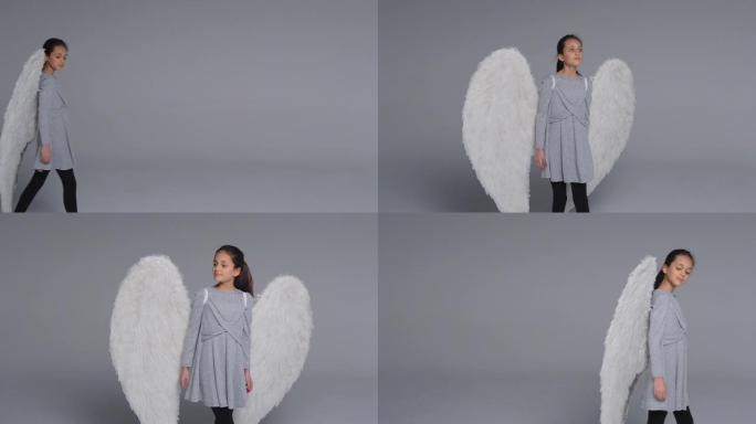工作室镜头女孩戴着天使翅膀