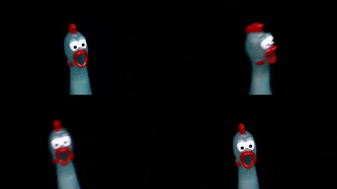 橡胶鸡的镜头黑暗背景