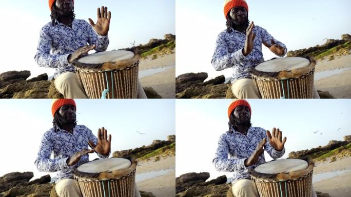 非洲打击乐，一个塞内加尔人用手演奏传统的djembe鼓。