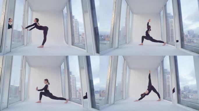 屋顶上的伸展舞蹈瑜伽练习芭蕾舞窗口