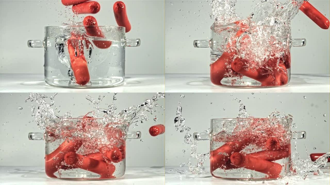 香肠落下一盆清澈的水，飞溅。以1000 fps的速度在高速相机上拍摄。