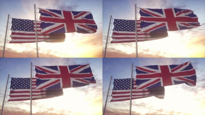旗杆上插着美国和英国的国旗。美国和英国在风中挥舞旗帜。美国和英国的外交概念