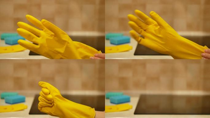 女人的手将黄色清洁手套放在舒适厨房的电磁炉前-4K，特写，黄色和蓝色