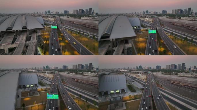空中无人机在曼谷日落场景的高速公路的高角度视图