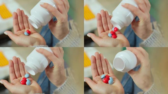 彩色药丸从药瓶中落在女人的手掌上。特写。药学和治疗概念，特写视图。