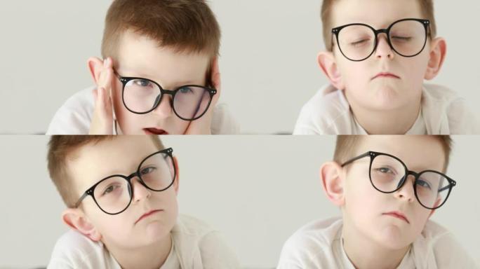 一个小男孩头疼，用手握住头。戴眼镜的高加索7岁男孩的肖像。感觉和情感概念。4k