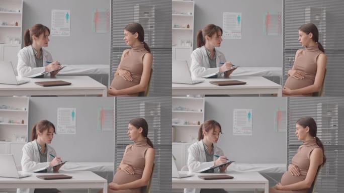 孕妇在与产科医生协商时