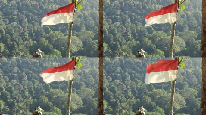 印度尼西亚的红白旗帜飘扬在山的上空