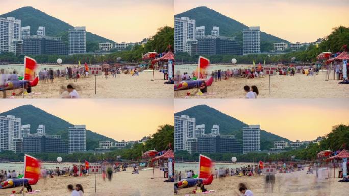 三亚著名的大东海拥挤海滩全景4k延时中国海南岛