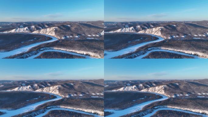 航拍大兴安岭激流河山林雪景