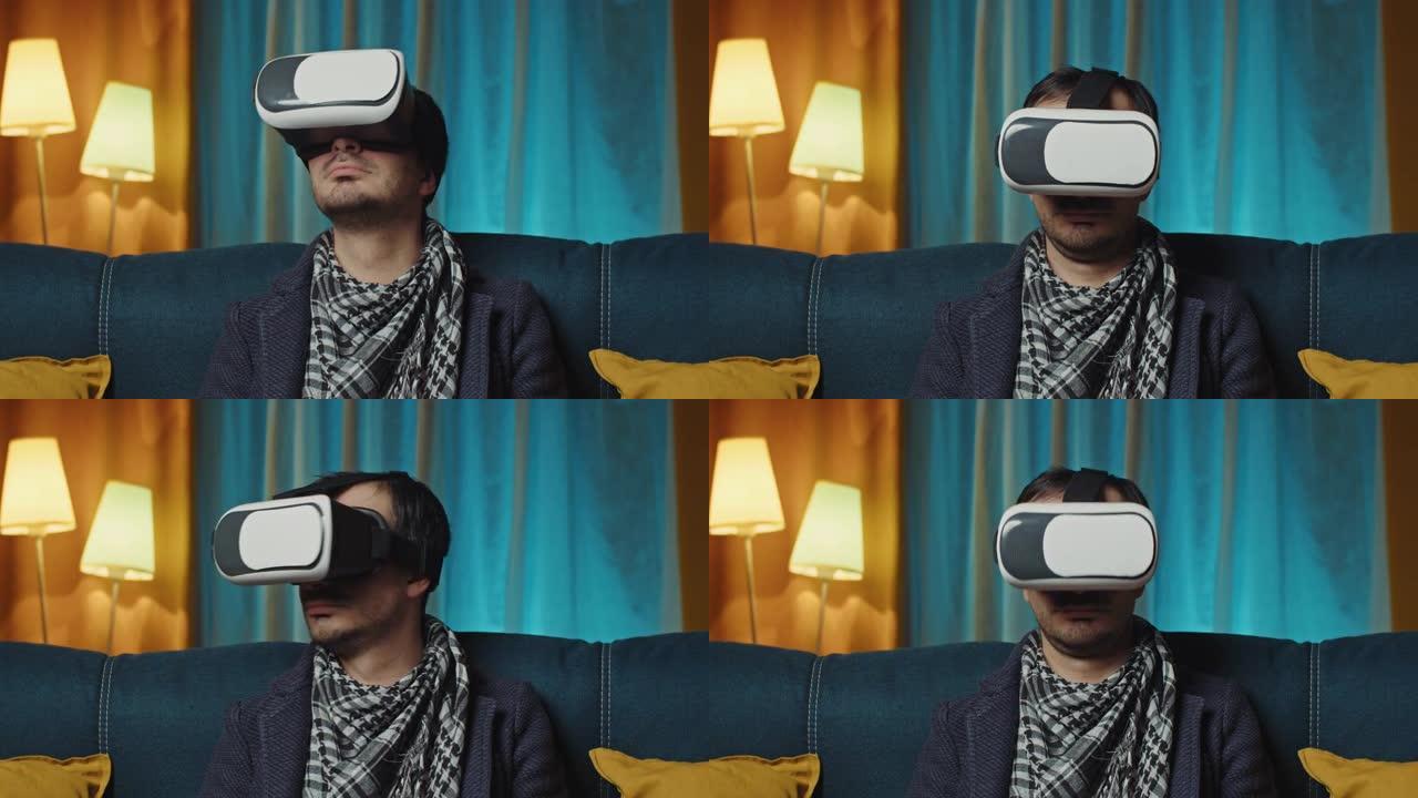 英俊的男人使用3D虚拟现实耳机。男人在客厅戴着VR耳机。男人在室内使用现代3D vr眼镜触摸东西。