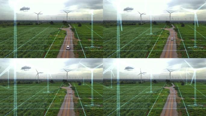 具有产生绿色能源的运动图形概念的风力涡轮机电力的鸟瞰图。未来技术的数字效果。
