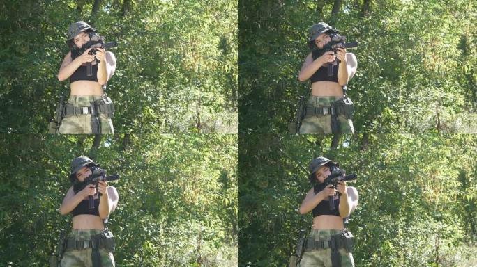拿着步枪机关枪的女兵站在森林里