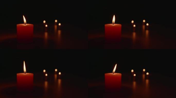 在黑暗中点燃蜡烛，火焰变暖，光产生散景。光和影创造气氛。比如浪漫、神秘、有趣，也会让你感到有信心。