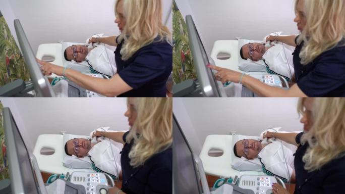使用超声扫描仪检查患者甲状腺的女医生