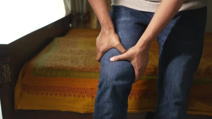 对患有膝关节疼痛的人进行特写。