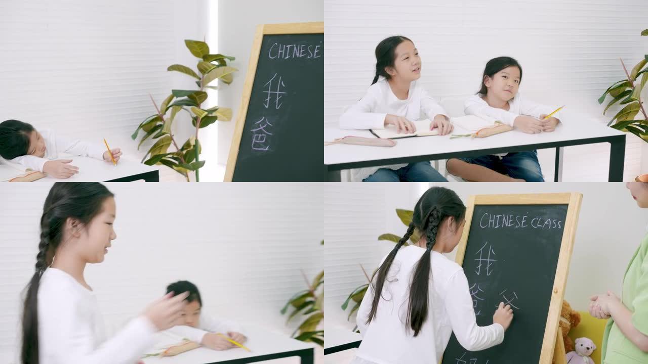 亚洲年轻的女老师在汉语课上教学和提问，而两个小学女生正试图举手回答问题。年轻的亚洲女孩在黑板上学习汉