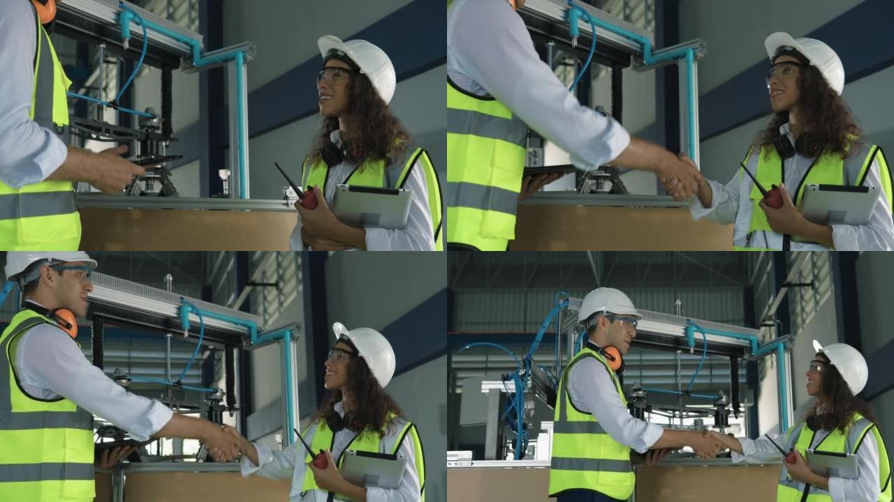 4k男女工程师检查机械臂运动以控制现代工厂的自动化生产线的质量